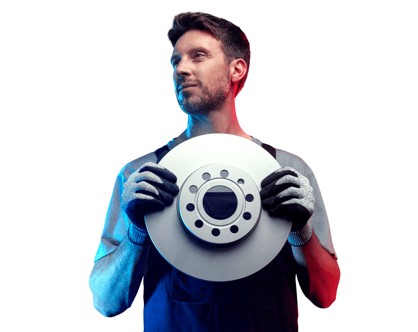 A mechanic holding a vehicle part