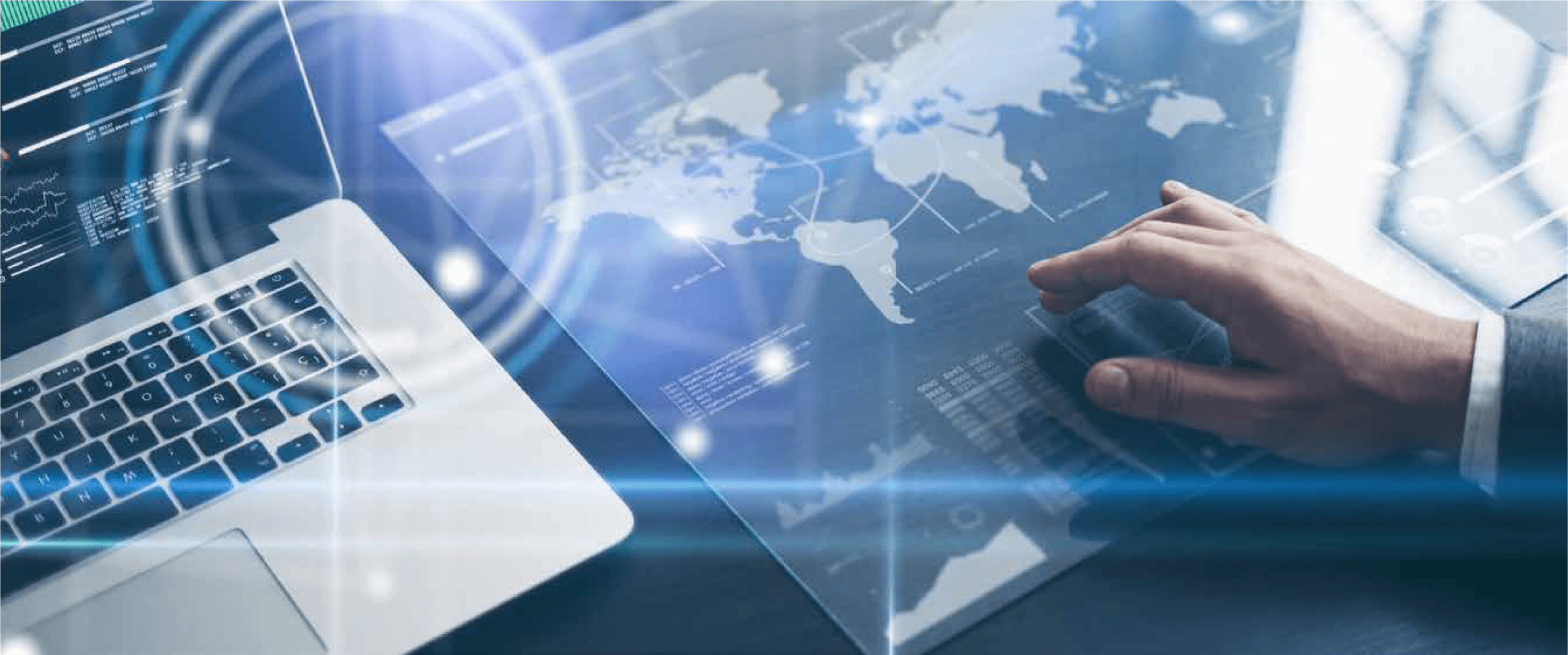 laptop keyboard and hand over world map global coverage